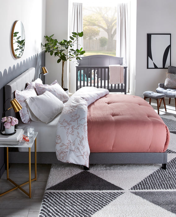 Lit rembourré Tara en tissu d’apparence lin gris avec capitonnage à boutons - format grand lit