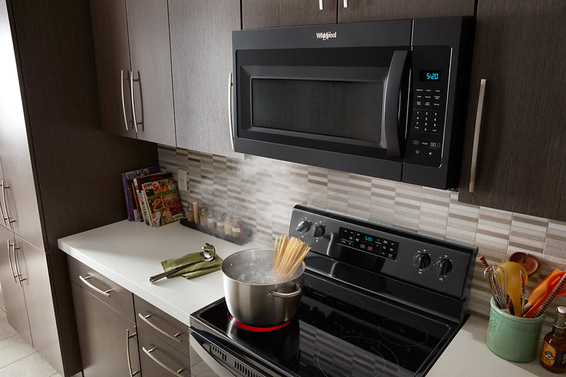 Four à micro-ondes à hotte intégrée Whirlpool de 1,7 pi³ avec cuisson à 900 W - noir - YWMH31017HB
