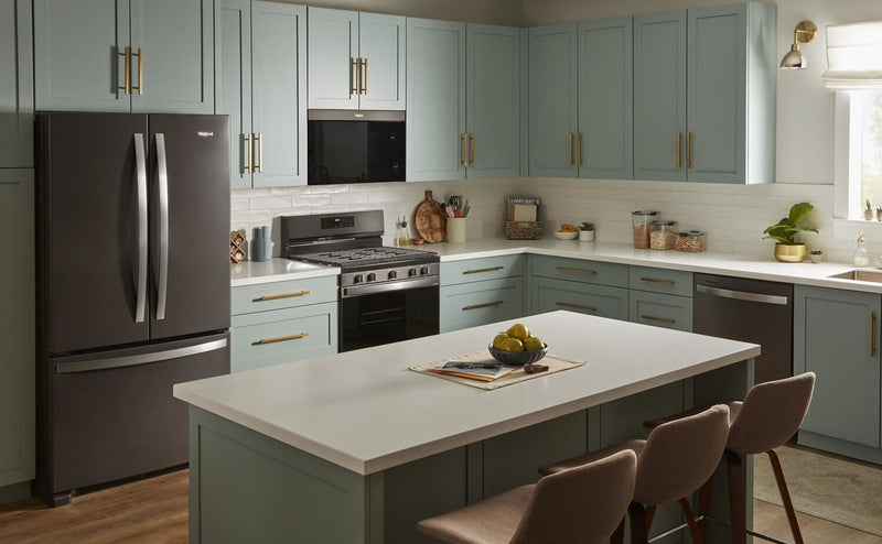 Four à micro-ondes à hotte intégrée Whirlpool de 1,1 pi³ à installation affleurée avec cuisson à 900 W - acier inoxydable noir - YWMMF5930PV