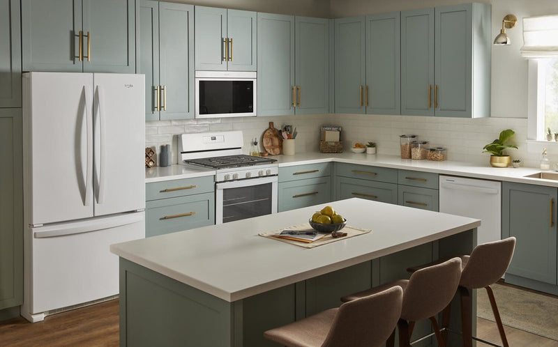 Four à micro-ondes à hotte intégrée Whirlpool de 1,1 pi³ à installation affleurée avec cuisson à 900 W - blanc - YWMMF5930PW