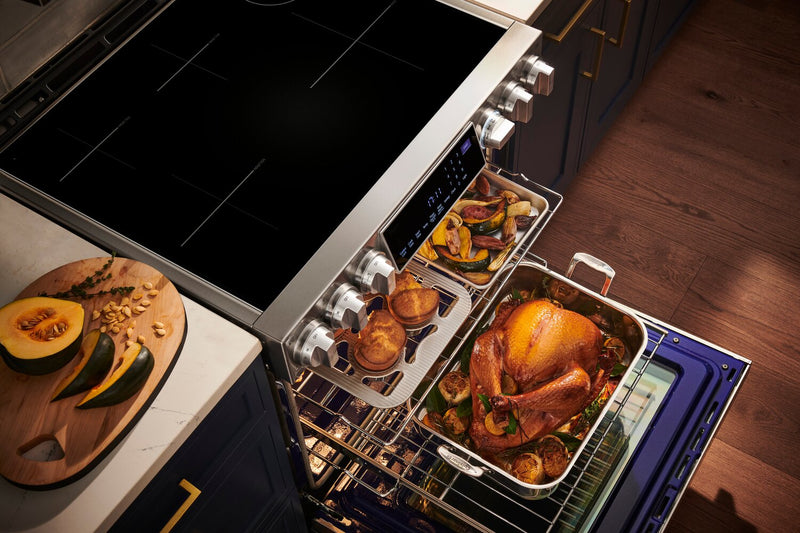 Cuisinière intelligente à induction LG Studio de 6,3 pi³ avec hublot InstaViewMD et friture à air - acier inoxydable Smudge-ProofMD - LSIS6338F