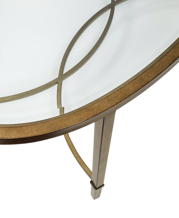 Table à café ovale traditionnelle Copia de 50 po avec dessus en verre - argentée et dorée avec base en métal