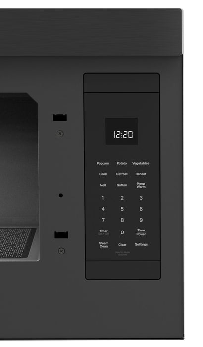 Four à micro-ondes à hotte intégrée Whirlpool de 1,1 pi³ à installation affleurée avec cuisson à 900 W - acier inoxydable noir - YWMMF5930PV
